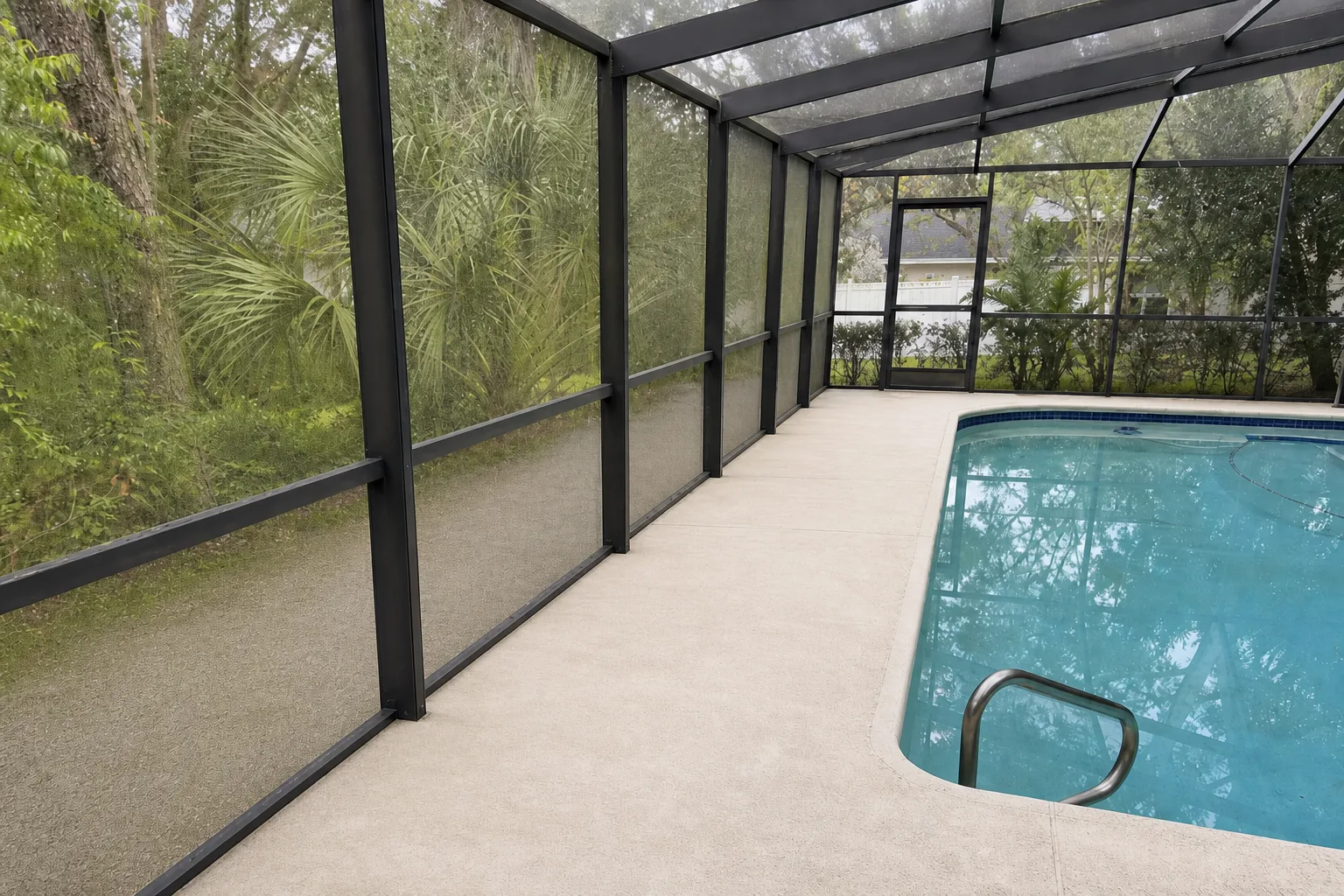 After pool deck and cage cleaning in Jacksonville with rinsed screens