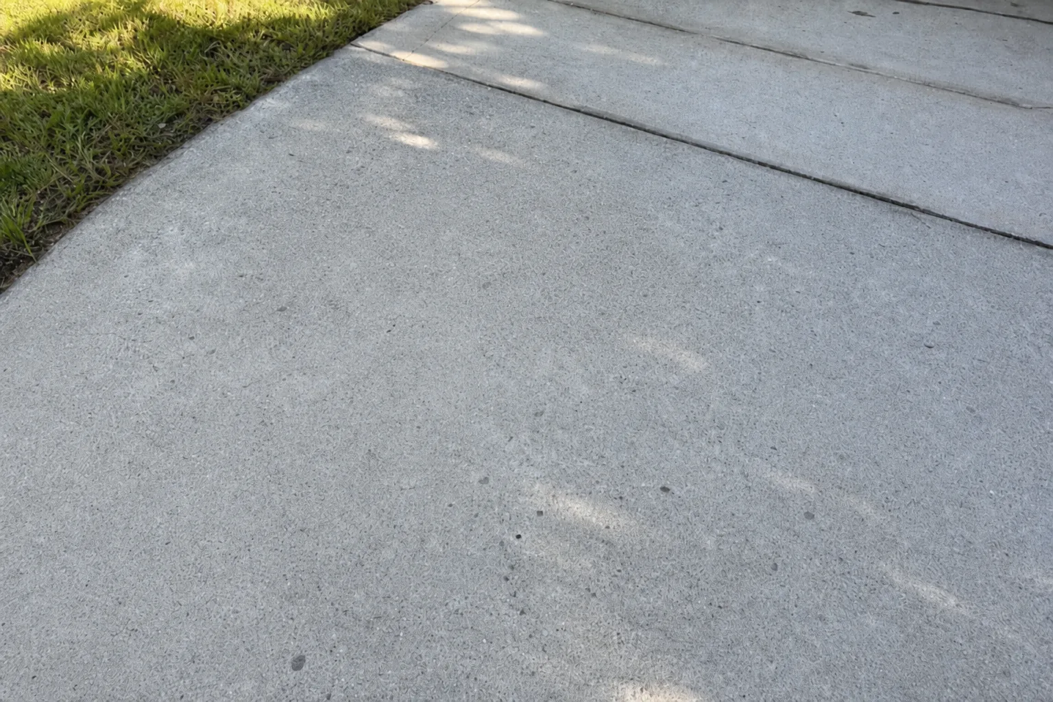After specialty stain treatment on Jacksonville concrete driveway